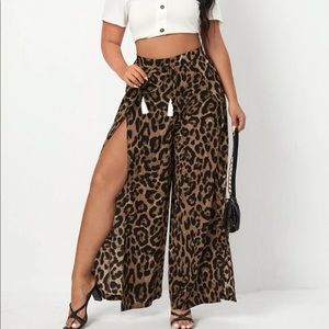 Plus size Leopard split thigh high wide leg pants. Perfect for a night out